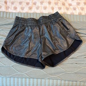 Lululemon Tracker short, 3.5”. Never worn by me.